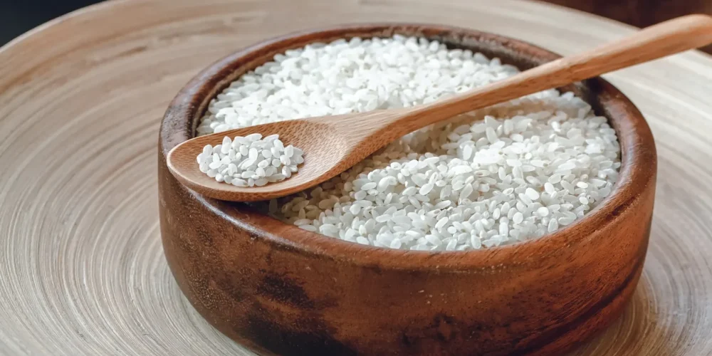 white-round-rice-in-a-wooden-bowl-with-wooden-or-b-2024-10-18-03-49-58-utc